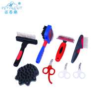 Pet grooming tangles away slicker and brush